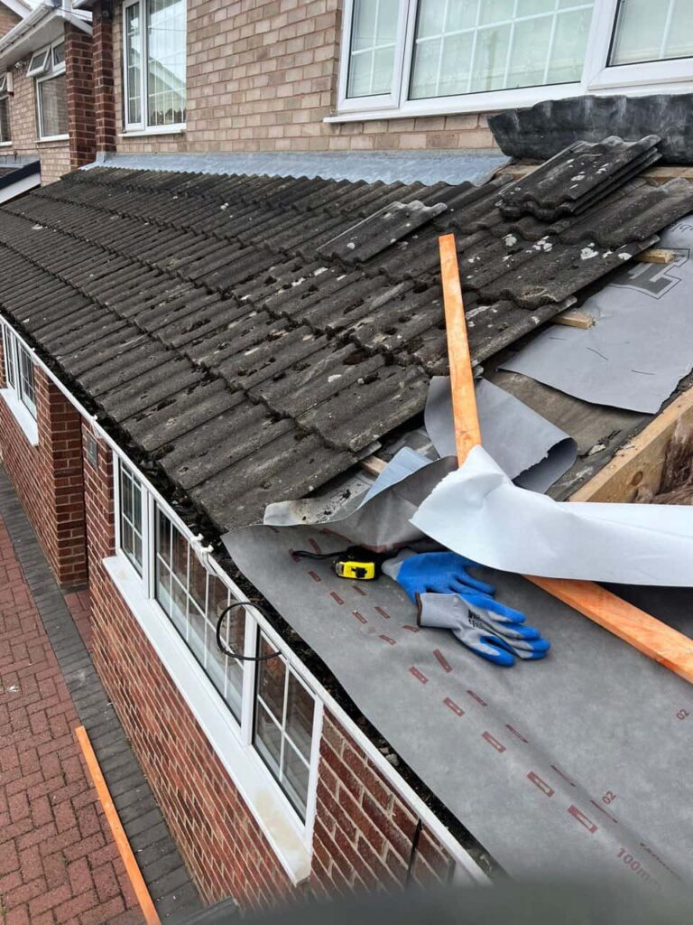 This is a photo of a pitched roof which is being repaired. The existing roof was leaking badly. Works carried out by MCM Roofing Repairs Hook